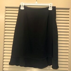 Black mid length skirt with ruffle